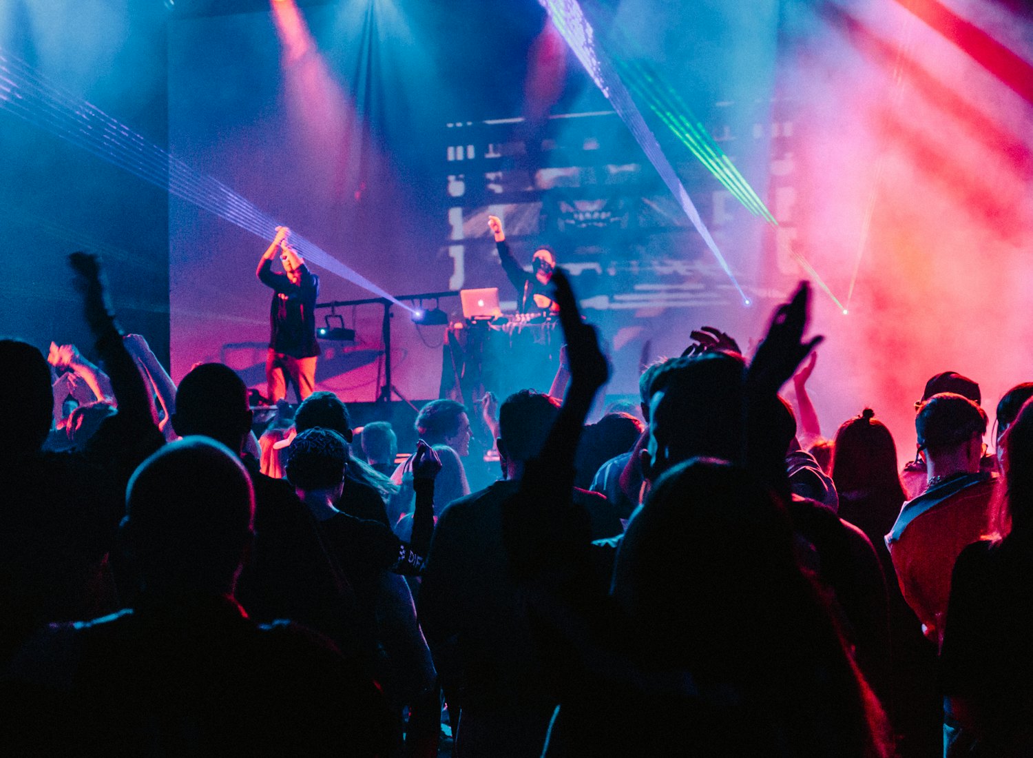 A live event crowd under stage lights